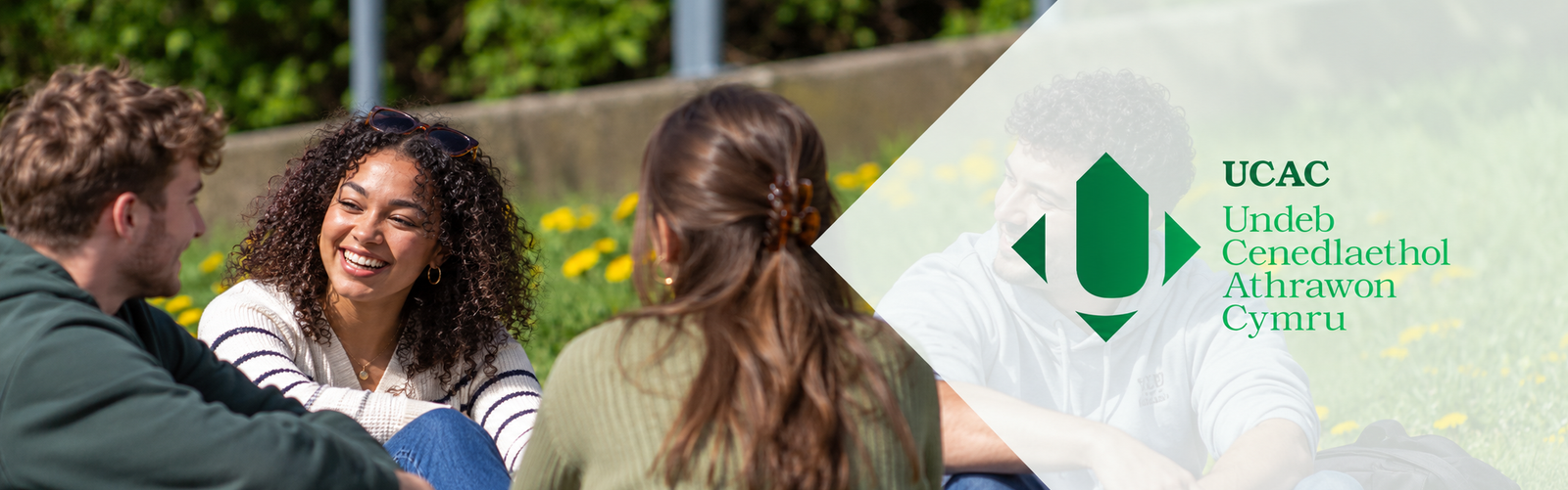 Students in conversation outdoors with UCAC branding